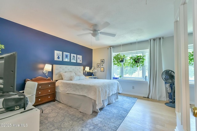 875 Martin Luther King Jr Blvd Apt 7, Chapel Hill, NC 27514 - bedroom featuring wood finished floors and a ceiling fan