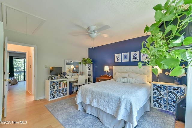 875 Martin Luther King Jr Blvd Apt 7, Chapel Hill, NC 27514 - bedroom with attic access, wood finished floors, and a ceiling fan