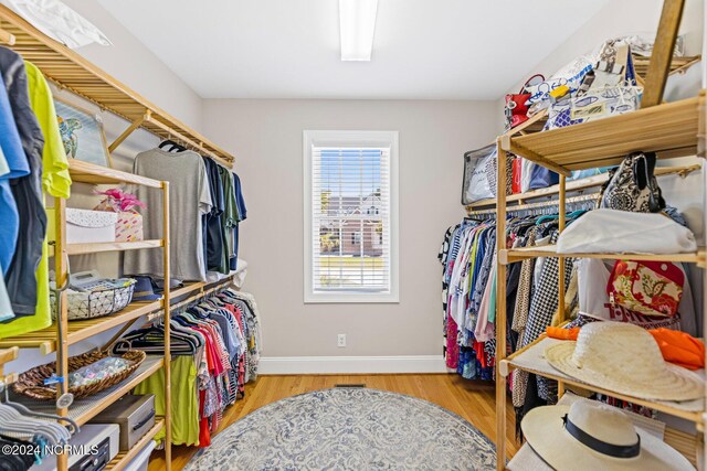 1119 Sea Bourne Way, Sunset Beach, NC 28468 - walk in closet with wood finished floors