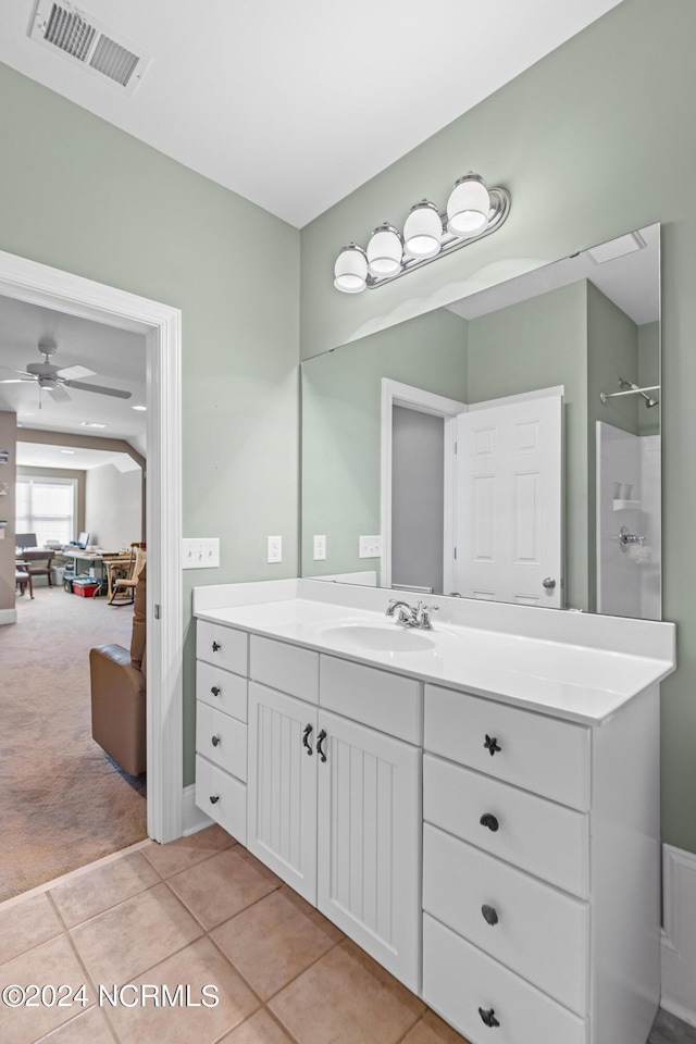 1119 Sea Bourne Way, Sunset Beach, NC 28468 - full bath with vanity, a shower, tile patterned flooring, and ceiling fan
