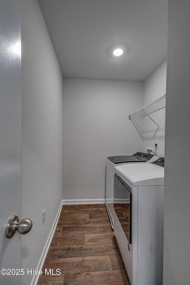 411 Isabelle St, New Bern, NC 28560 - laundry area featuring washer and dryer and dark wood-style flooring