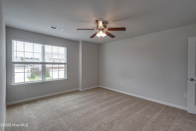 411 Isabelle St, New Bern, NC 28560 - carpeted spare room featuring a ceiling fan and baseboards