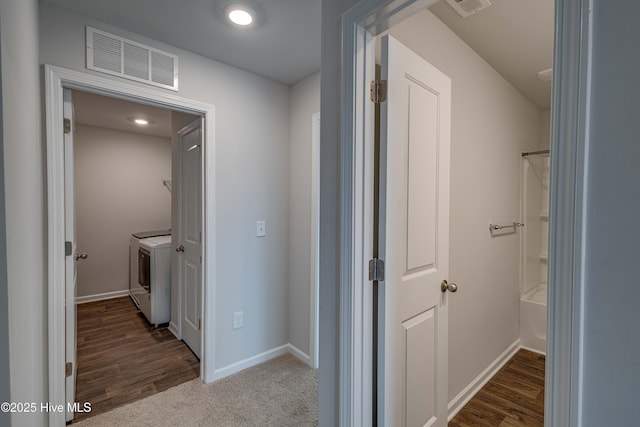 411 Isabelle St, New Bern, NC 28560 - hallway featuring washer and clothes dryer and baseboards