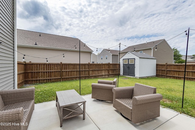 411 Isabelle St, New Bern, NC 28560 - fenced backyard with a patio, a storage unit, and a residential view