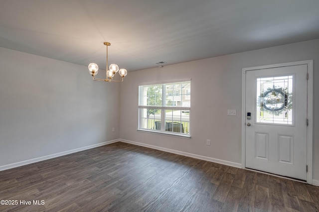 411 Isabelle St, New Bern, NC 28560 - foyer with dark wood-type flooring and a chandelier