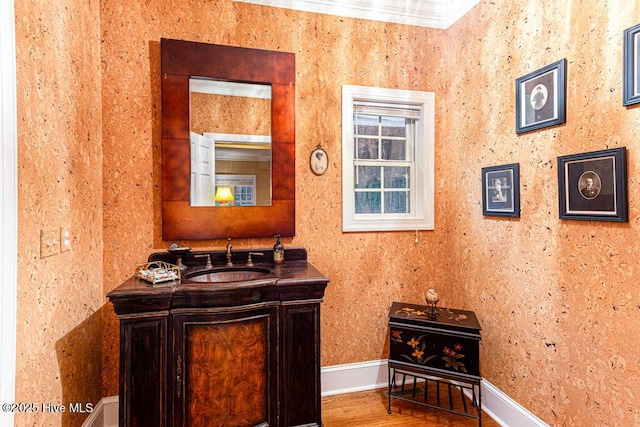 35 Magnolia Ave, Pinehurst, NC 28374 - bathroom with vanity, crown molding, and wood finished floors