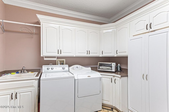 35 Magnolia Ave, Pinehurst, NC 28374 - laundry area featuring cabinet space, washer and dryer, ornamental molding, and a textured ceiling