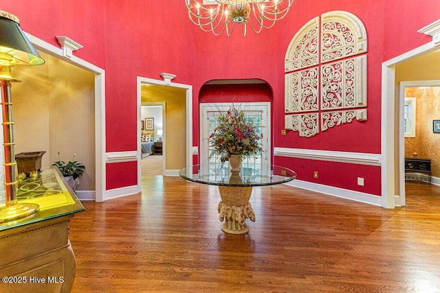 35 Magnolia Ave, Pinehurst, NC 28374 - foyer with a chandelier, wood finished floors, and a towering ceiling