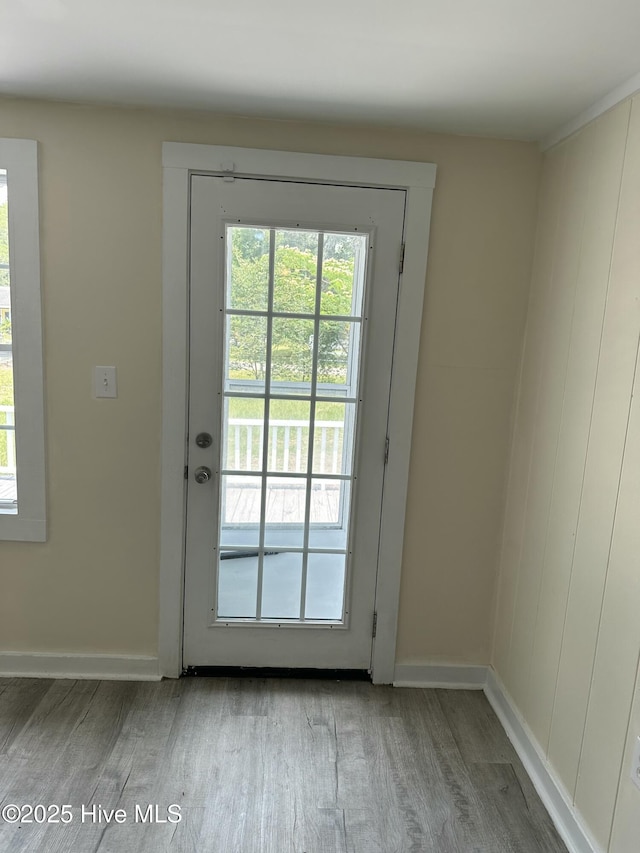 4735 Cedar Ln SW, Ocean Isle Beach, NC 28469 - doorway to outside with light wood-type flooring and healthy amount of natural light