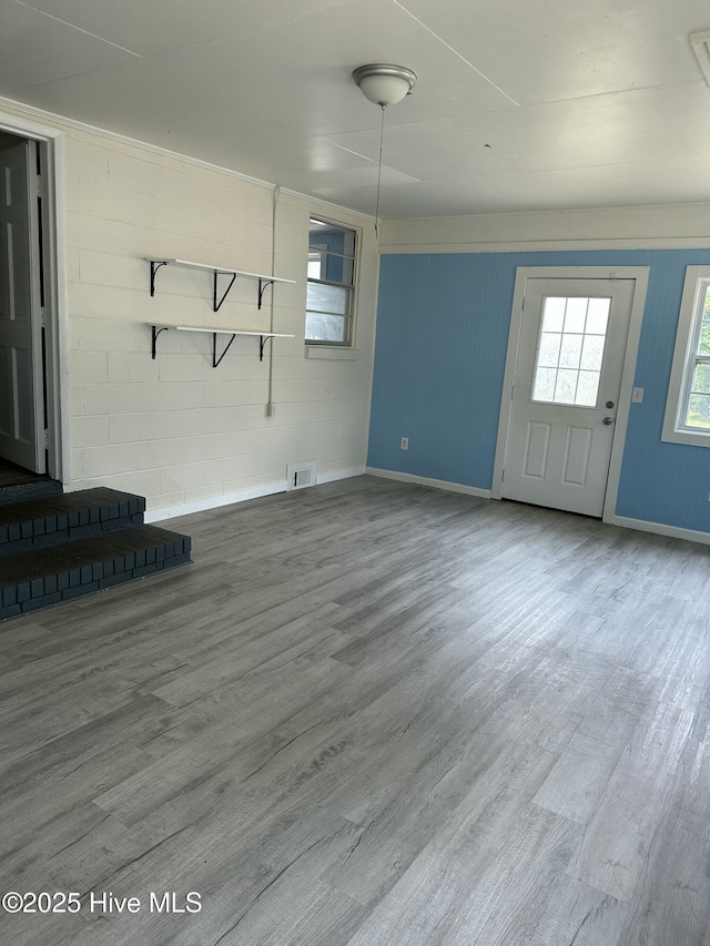 4735 Cedar Ln SW, Ocean Isle Beach, NC 28469 - unfurnished living room with wood finished floors