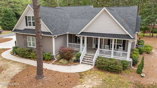 1 Miles Ct, Pinehurst, NC 28374 - view of front of house with covered porch, roof with shingles, and stairs