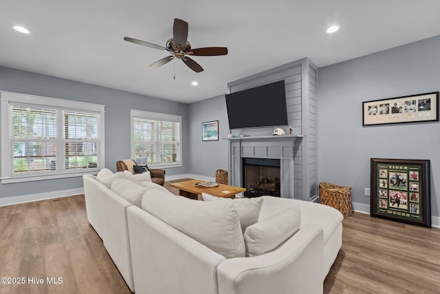 1 Miles Ct, Pinehurst, NC 28374 - living area featuring a fireplace, wood finished floors, recessed lighting, and a ceiling fan