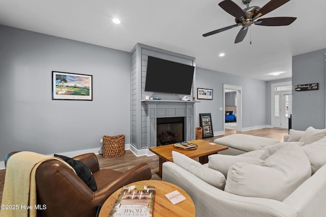 1 Miles Ct, Pinehurst, NC 28374 - living area with wood finished floors, recessed lighting, a ceiling fan, and a large fireplace