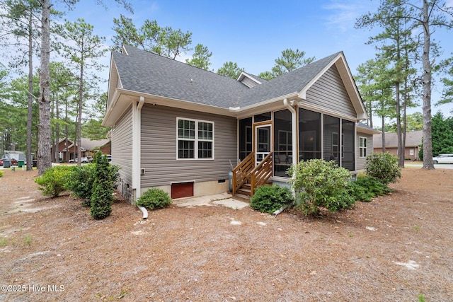 1 Miles Ct, Pinehurst, NC 28374 - rear view of house featuring a sunroom and roof with shingles