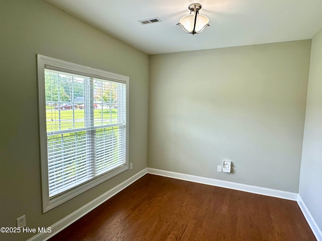 802 Bayhill Ct, Greenville, NC 27858 - unfurnished room featuring baseboards and dark wood-style floors
