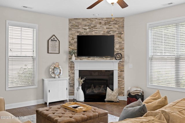 3243 Kellerton Pl, Wilmington, NC 28409 - living area with ceiling fan, a glass covered fireplace, and wood finished floors