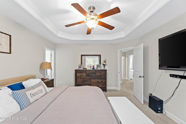 3243 Kellerton Pl, Wilmington, NC 28409 - bedroom featuring a tray ceiling, light carpet, ornamental molding, and ceiling fan