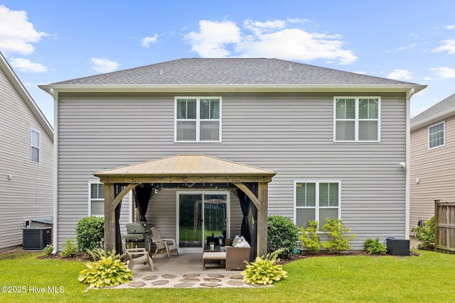 3243 Kellerton Pl, Wilmington, NC 28409 - rear view of house with a gazebo, a patio area, and a lawn