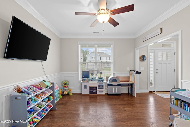 3243 Kellerton Pl, Wilmington, NC 28409 - game room featuring a ceiling fan, ornamental molding, wainscoting, and wood finished floors