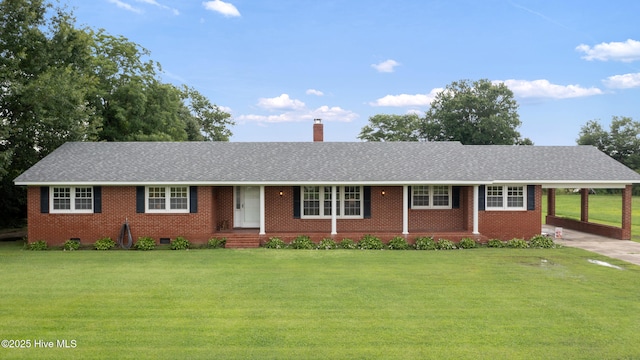 304 N Main St, Colerain, NC 27924 - ranch-style house featuring a chimney, a front lawn, brick siding, and a shingled roof