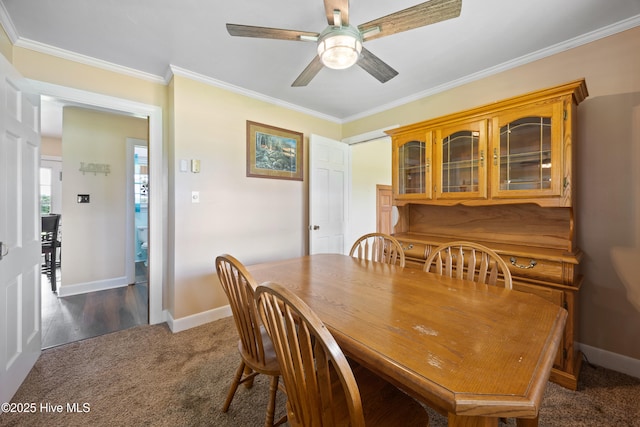 304 N Main St, Colerain, NC 27924 - dining area with crown molding, dark carpet, and a ceiling fan