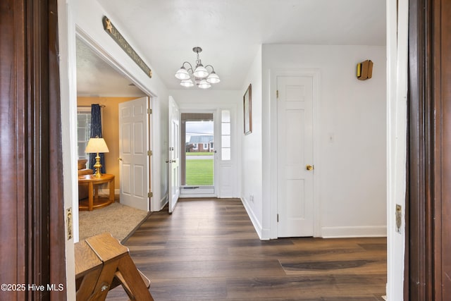 304 N Main St, Colerain, NC 27924 - entryway with a chandelier and dark wood-style flooring