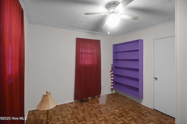 1311 Hazel Ave, New Bern, NC 28560 - unfurnished room with a ceiling fan and a textured ceiling