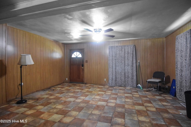 1311 Hazel Ave, New Bern, NC 28560 - foyer featuring ceiling fan and wood walls