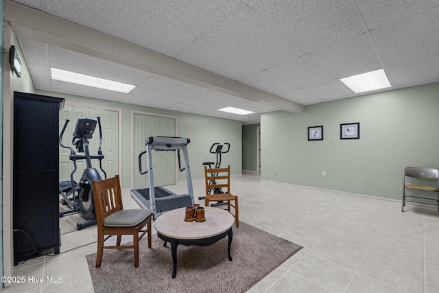 115 Baker Cir W, End, NC 27376 - exercise area with a drop ceiling and light tile patterned flooring