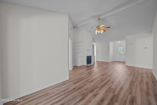 108 Bayswater Ct, New Bern, NC 28562 - unfurnished living room featuring a glass covered fireplace, wood finished floors, and ceiling fan