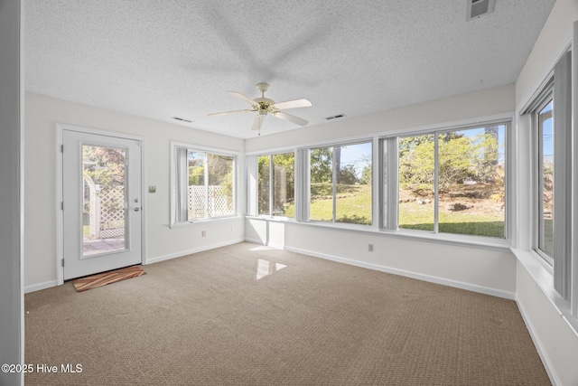 108 Bayswater Ct, New Bern, NC 28562 - unfurnished sunroom with plenty of natural light, carpet floors, and a textured ceiling