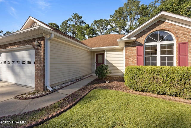 108 Bayswater Ct, New Bern, NC 28562 - view of front of property featuring brick siding, a garage, concrete driveway, and a front yard