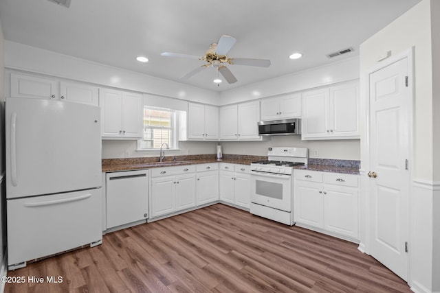 108 Bayswater Ct, New Bern, NC 28562 - kitchen featuring white appliances, white cabinetry, wood finished floors, ceiling fan, and recessed lighting