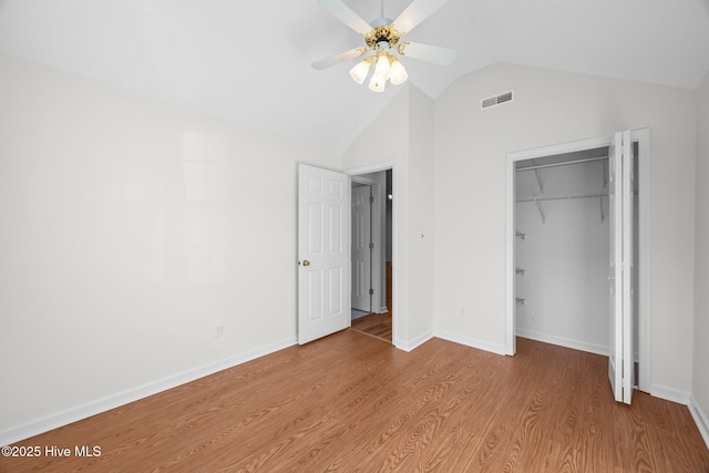 108 Bayswater Ct, New Bern, NC 28562 - unfurnished bedroom featuring lofted ceiling, light wood-style floors, a closet, and ceiling fan