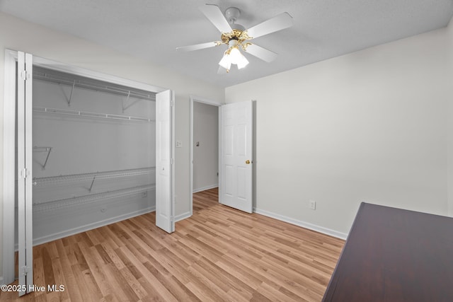 108 Bayswater Ct, New Bern, NC 28562 - unfurnished bedroom featuring light wood-type flooring, a closet, and a ceiling fan