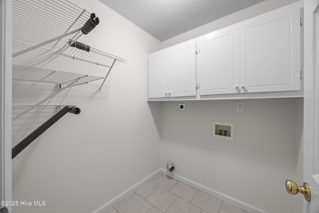 108 Bayswater Ct, New Bern, NC 28562 - laundry area with cabinet space, hookup for a washing machine, electric dryer hookup, light tile patterned floors, and a textured ceiling
