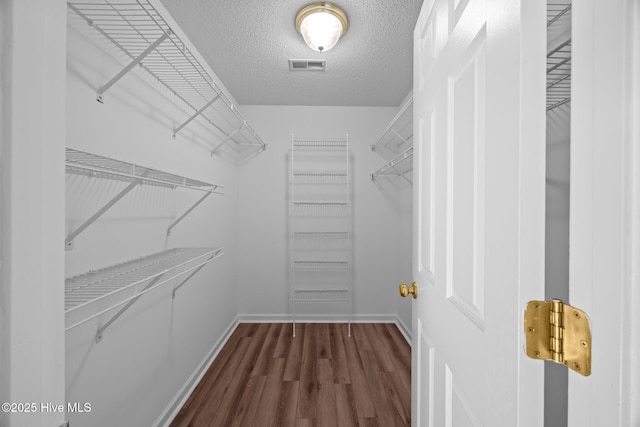 108 Bayswater Ct, New Bern, NC 28562 - spacious closet with dark wood-type flooring