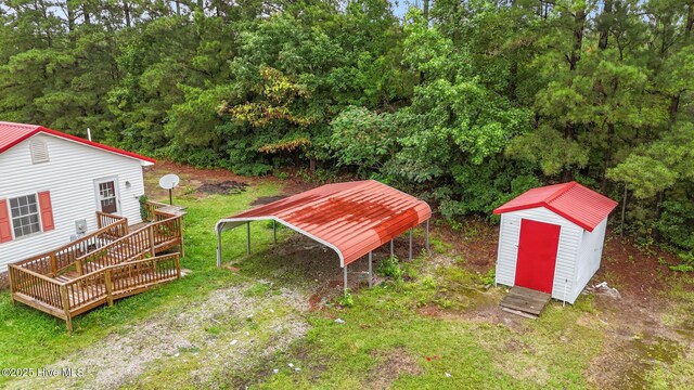 1218 Early Station Rd, Aulander, NC 27805 - view of yard featuring a storage shed and a wooden deck