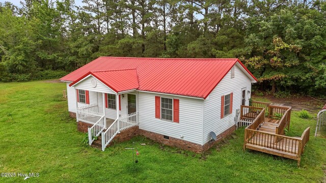 1218 Early Station Rd, Aulander, NC 27805 - view of front of home with crawl space, stairway, a porch, a front yard, and a metal roof