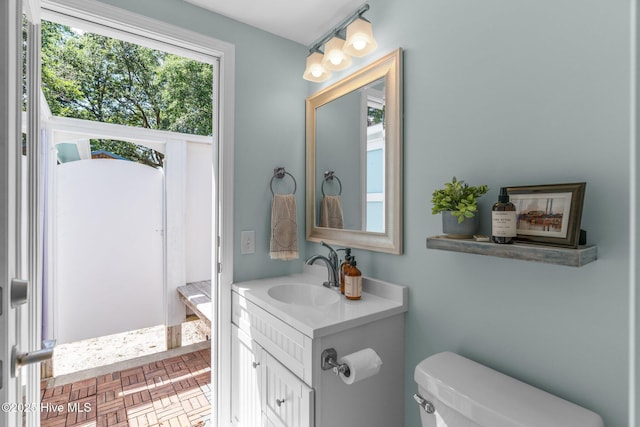 125 NE 13th St, Oak Island, NC 28465 - bathroom featuring vanity and toilet