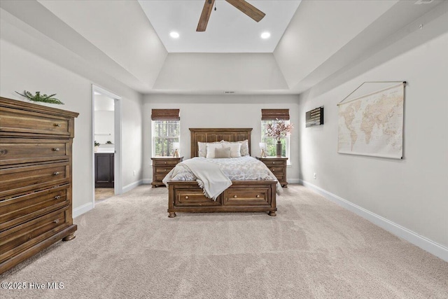 621 Longleaf Rd, Aberdeen, NC 28315 - bedroom featuring light carpet, connected bathroom, a tray ceiling, recessed lighting, and a ceiling fan