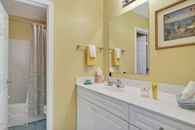 104 NE 27th St, Oak Island, NC 28465 - full bath with vanity, tile patterned flooring, and shower / bath combo with shower curtain