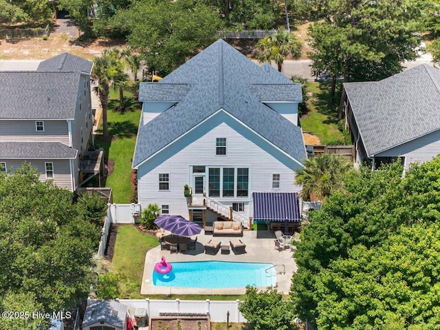 104 NE 27th St, Oak Island, NC 28465 - view of subject property featuring a pool area