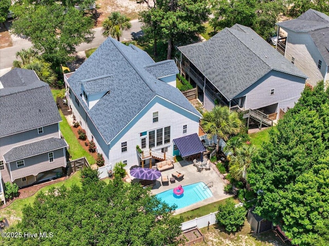 104 NE 27th St, Oak Island, NC 28465 - view from above of property with a pool