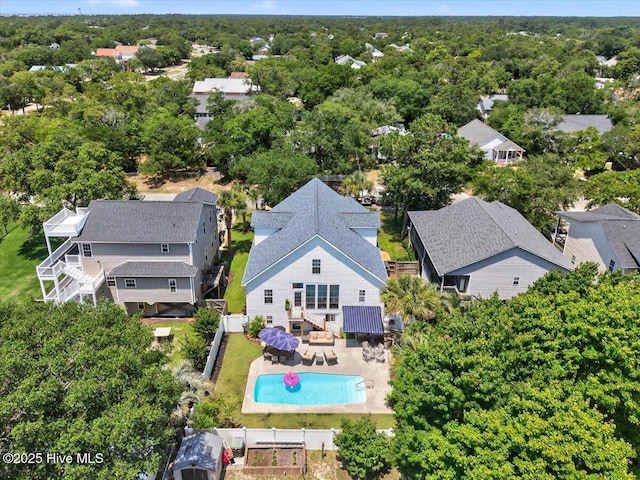 104 NE 27th St, Oak Island, NC 28465 - view from above of property with a pool area