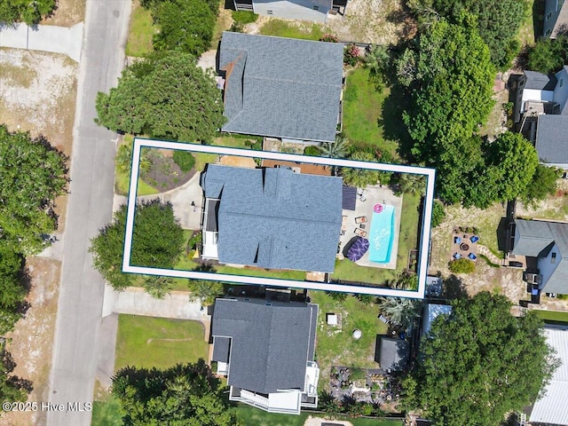 104 NE 27th St, Oak Island, NC 28465 - aerial view of residential area with property boundaries highlighted
