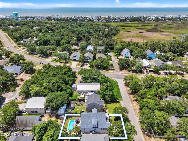 104 NE 27th St, Oak Island, NC 28465 - aerial view of residential area with property boundaries highlighted