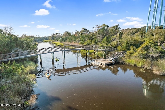 104 NE 27th St, Oak Island, NC 28465 - dock featuring a water view