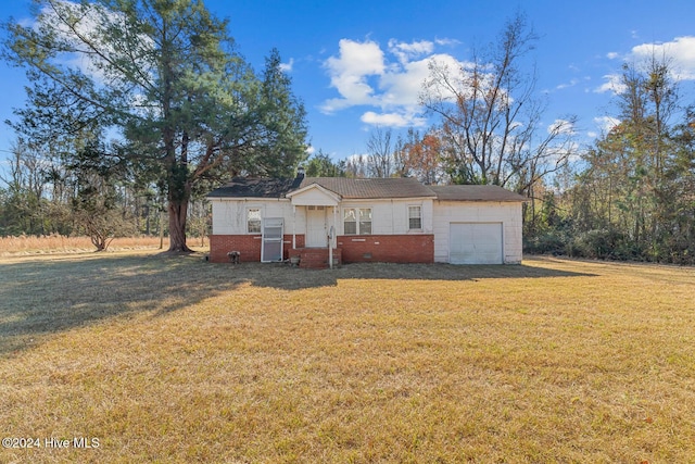 9626 NC Highway 50, Maple Hill, NC 28454 - view of front of house featuring a garage and a front lawn