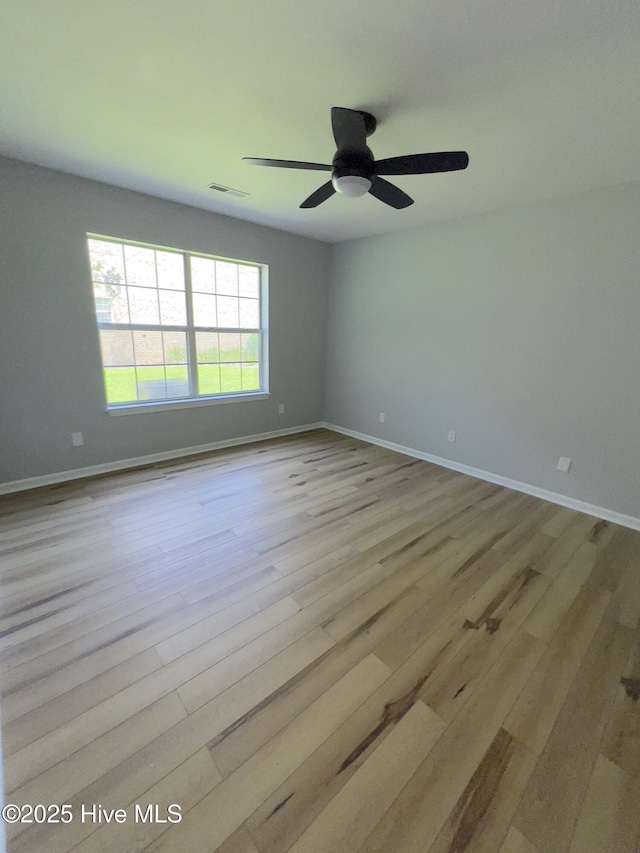 2940 Mulberry Ln Unit B, Greenville, NC 27858 - spare room featuring wood finished floors and ceiling fan